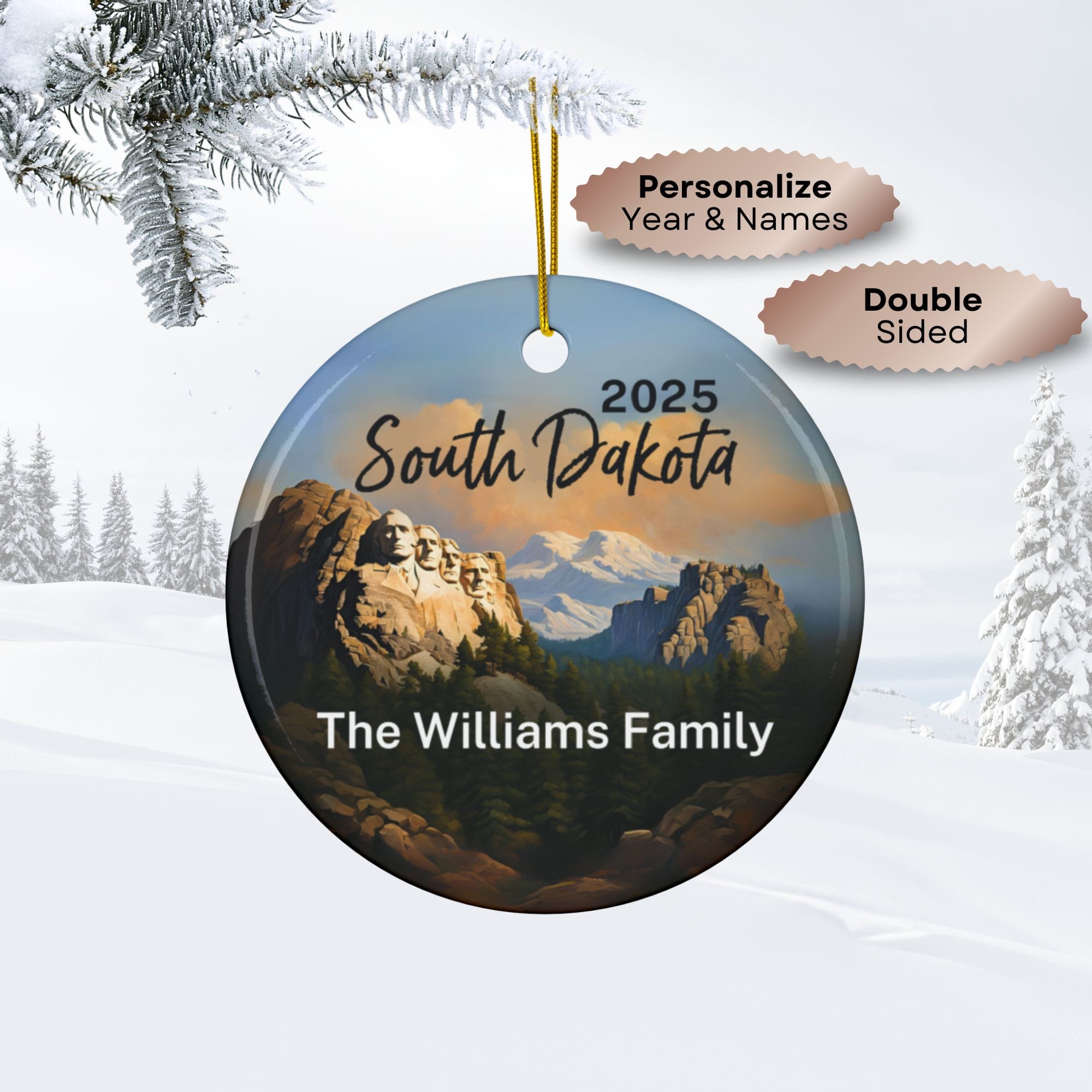 Round South Dakota Ornament featuring a Mount Rushmore illustration, “2025 South Dakota” text, and “The Williams Family” below. Snowy background with tree branch. Text bubbles say Personalize Year & Names and Double Sided.