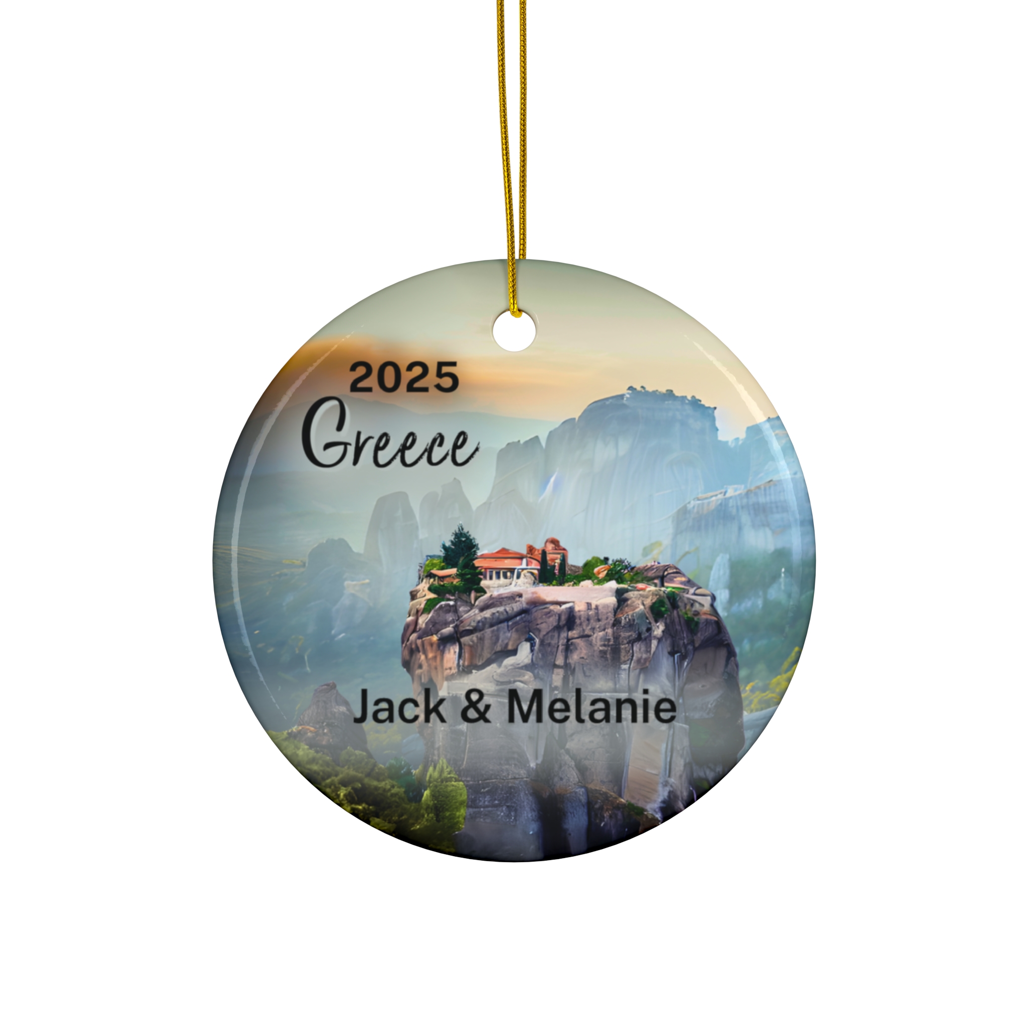 Round personalized ornament with a golden string, featuring a Meteora Greece monastery scene labeled 2025 Greece and Jack & Melanie in elegant fonts, set against a misty blue and green landscape. A perfect custom year ornament for your collection.