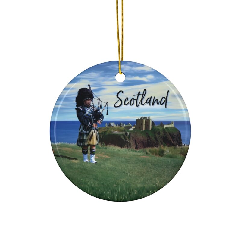 Scotland Bagpiper on cliff overlooking Dunnottar Castle: Personalized ceramic travel-themed oil-painting printed ornament 2025, single-sided or double-sided, customizable name and year, unique holiday gifts for travelers to remember your vacation or trip. Every Adventure Remembered.